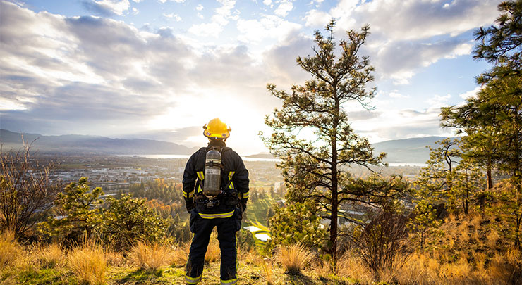 A firefighter taking a moment to appreciate the scenic city view