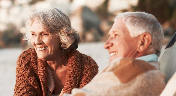 Senior couple relaxing on the beach