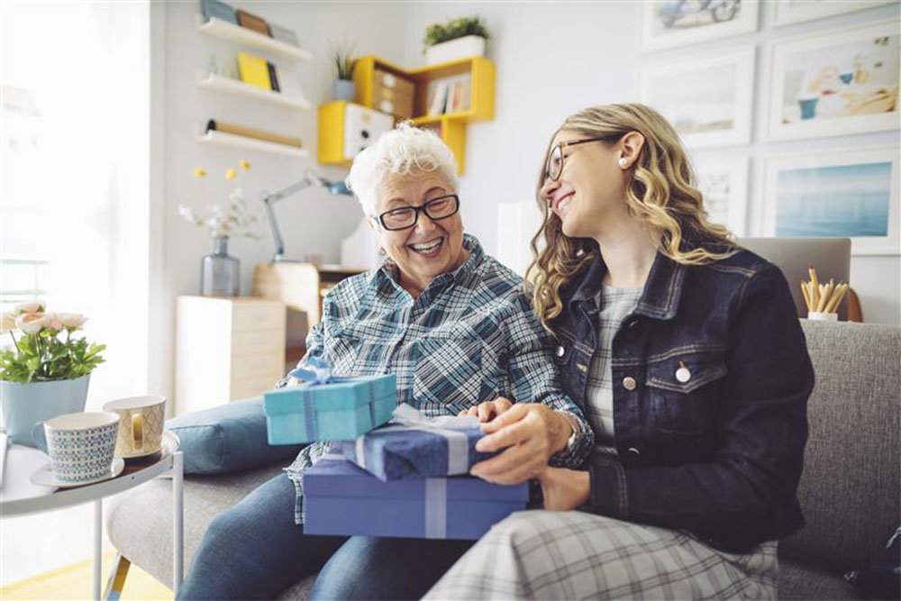 Grandmother and granddaughter creating memories through gift giving